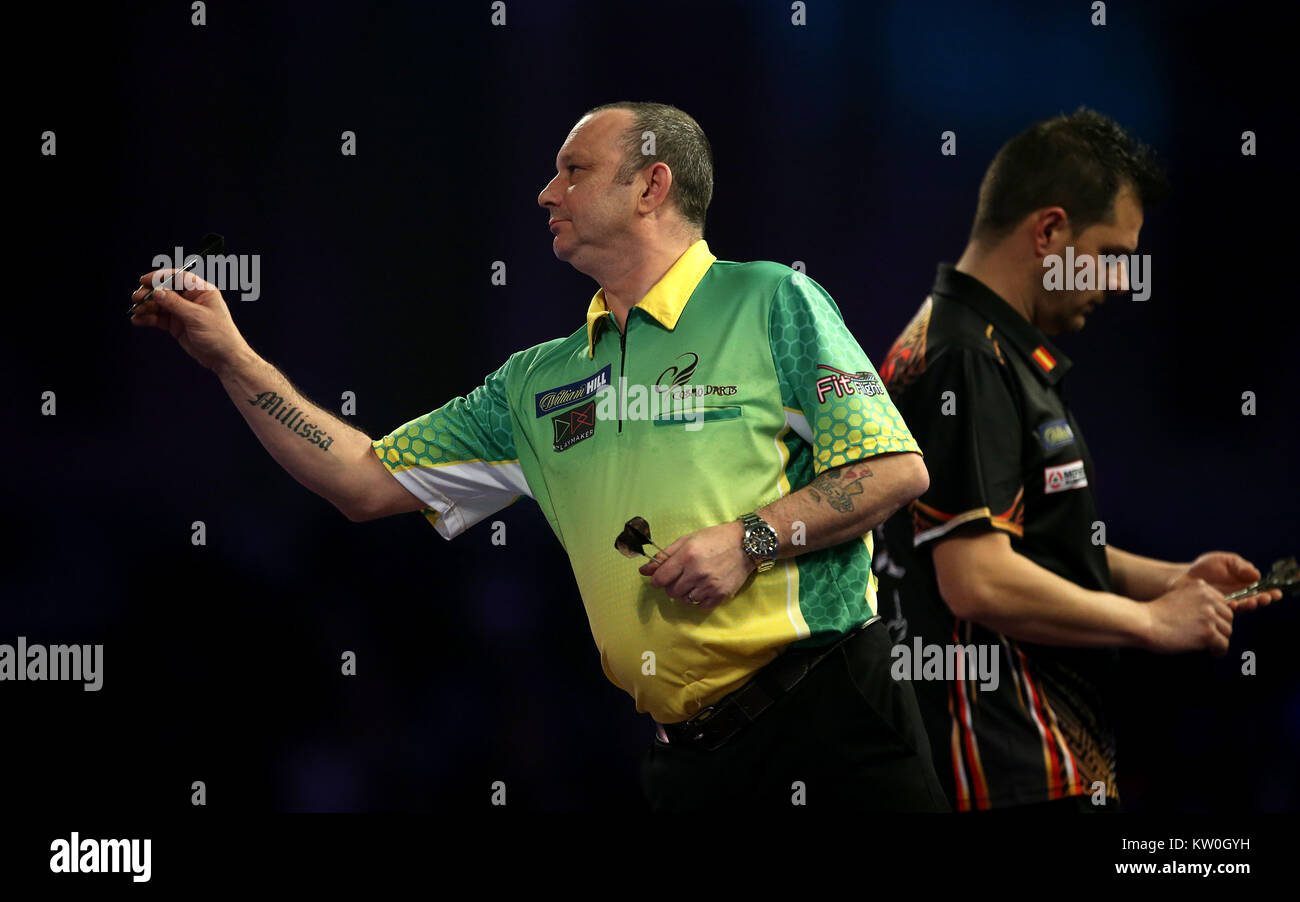 Darren Webster and Toni Alcinas in action during day twelve of the William Hill World Darts Championship at Alexandra Palace, London. PRESS ASSOCIATION Photo. Picture date: Thursday December 28, 2017. See PA story DARTS World. Photo credit should read: Steven Paston/PA Wire. Stock Photo