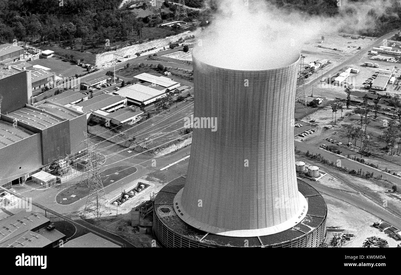 TARONG, AUSTRALIA, CIRCA 1980: Steam rises from a cooling tower at a coal-fired power station during construction circa 1980 at Tarong, Queensland, Australia. Stock Photo