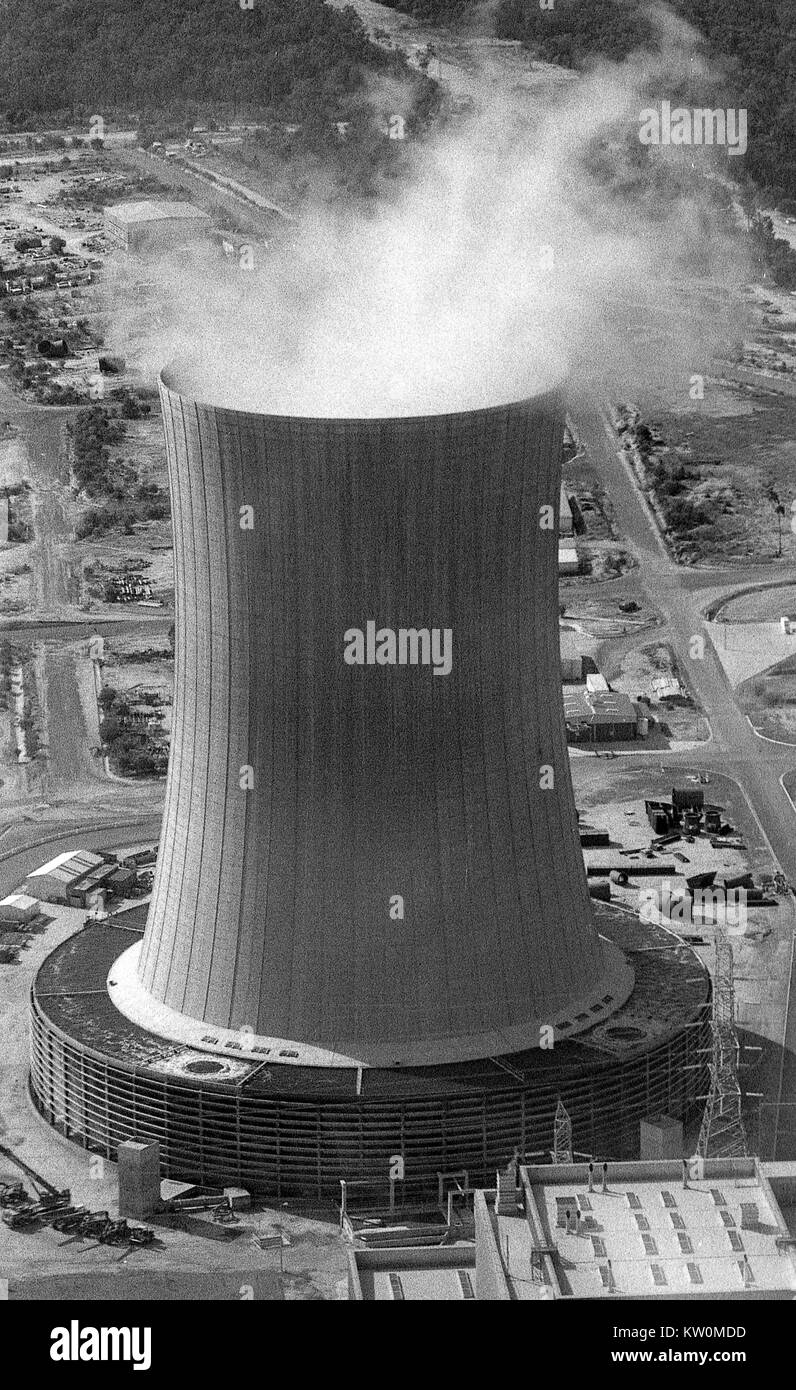TARONG, AUSTRALIA, CIRCA 1980: Steam rises from a cooling tower at a coal-fired power station during construction circa 1980 at Tarong, Queensland, Australia. Stock Photo