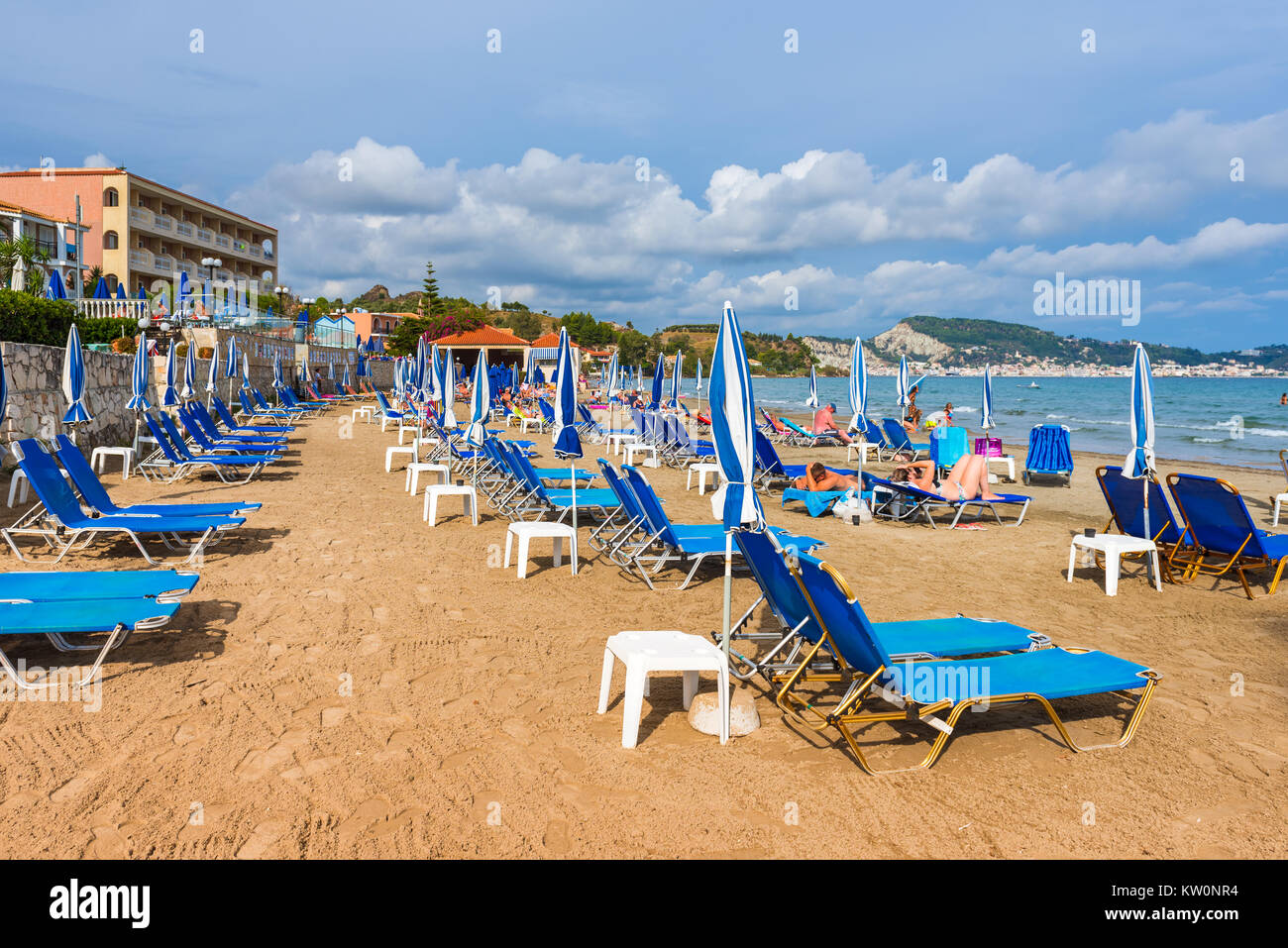 ZAKYNTHOS, GREECE - September 28, 2017: Parasols and sunbeds on Argassi  beach, one of the best beautiful sandy beaches of east coast of Zakynthos  isla Stock Photo - Alamy