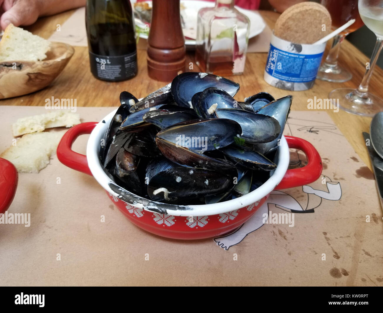 Black mussels steamed with pasta ready to eat and eaten Stock Photo