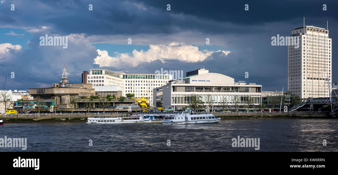 Clouds over London Southbank with the River Thames, Shell Centre Tower, Royal Festival Hall, Queen Elizabeth Hall & Waterloo Bridge. London, UK Stock Photo