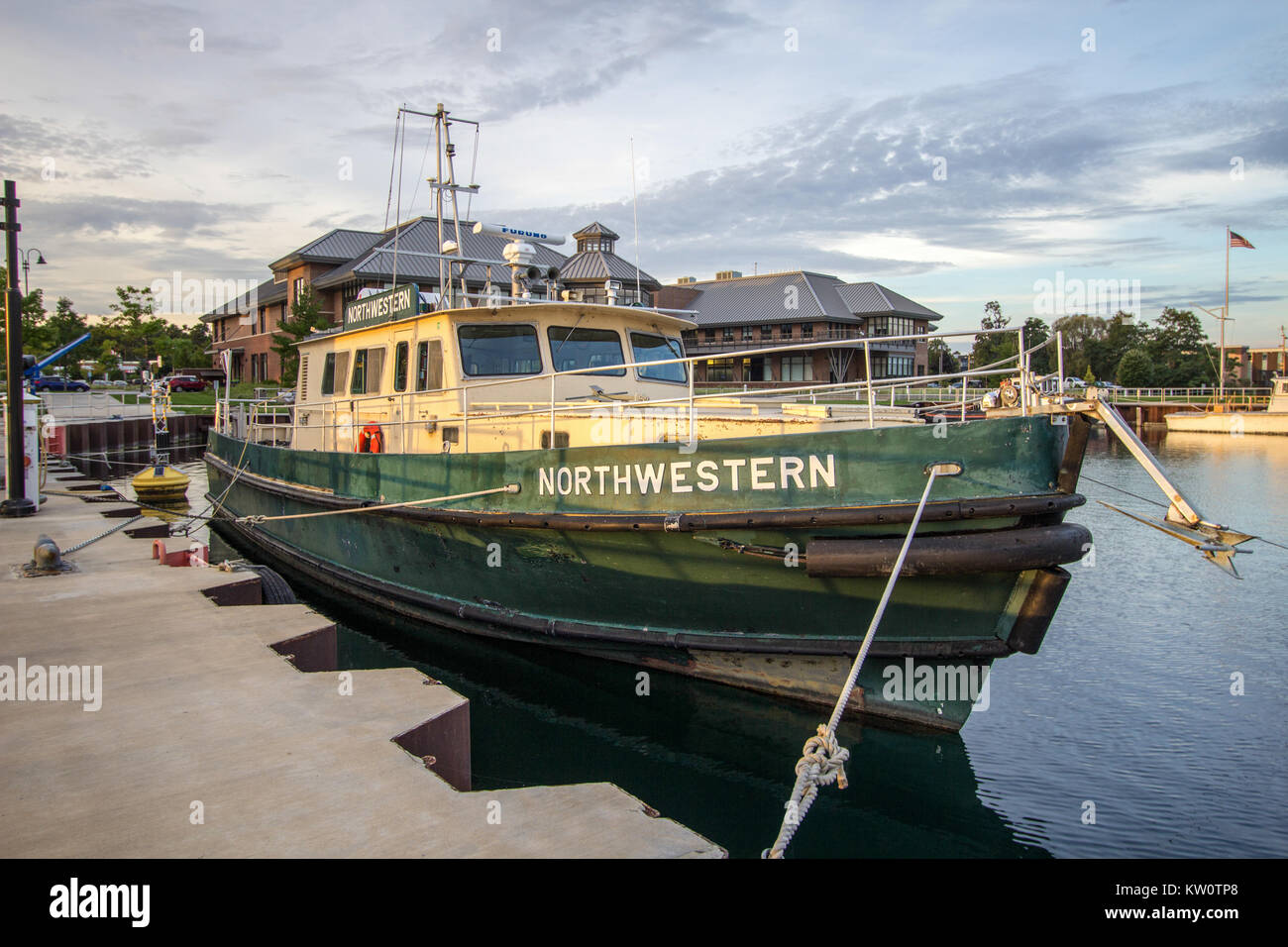The Northwestern boat docked at the harbor for the Great Lakes Maritime Academy. The Academy is on the campus of Northwestern Michigan University. Stock Photo