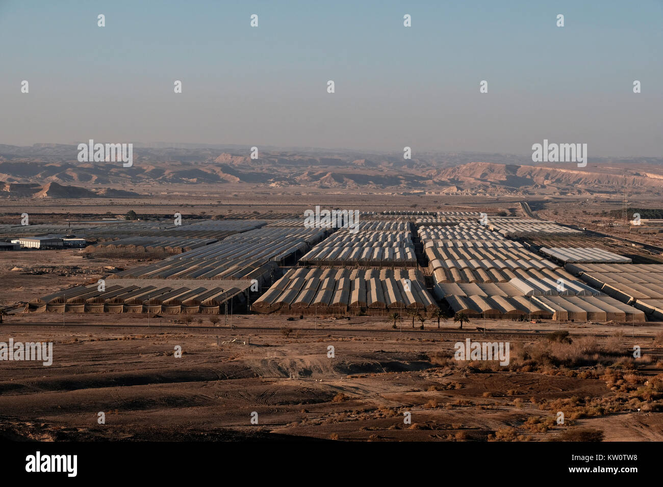 Aerial view of greenhouses in an agriculture field of the cooperative agricultural community of Paran located in the western of the Arabah valley known in Hebrew as Arava or Aravah which forms part of the border between Israel and Jordan. Stock Photo
