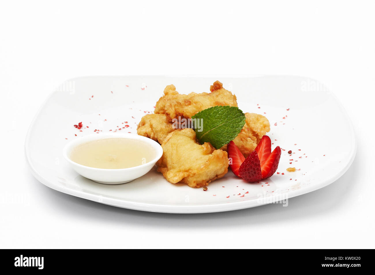 Chicken food with sauce on white plate  Stock Photo