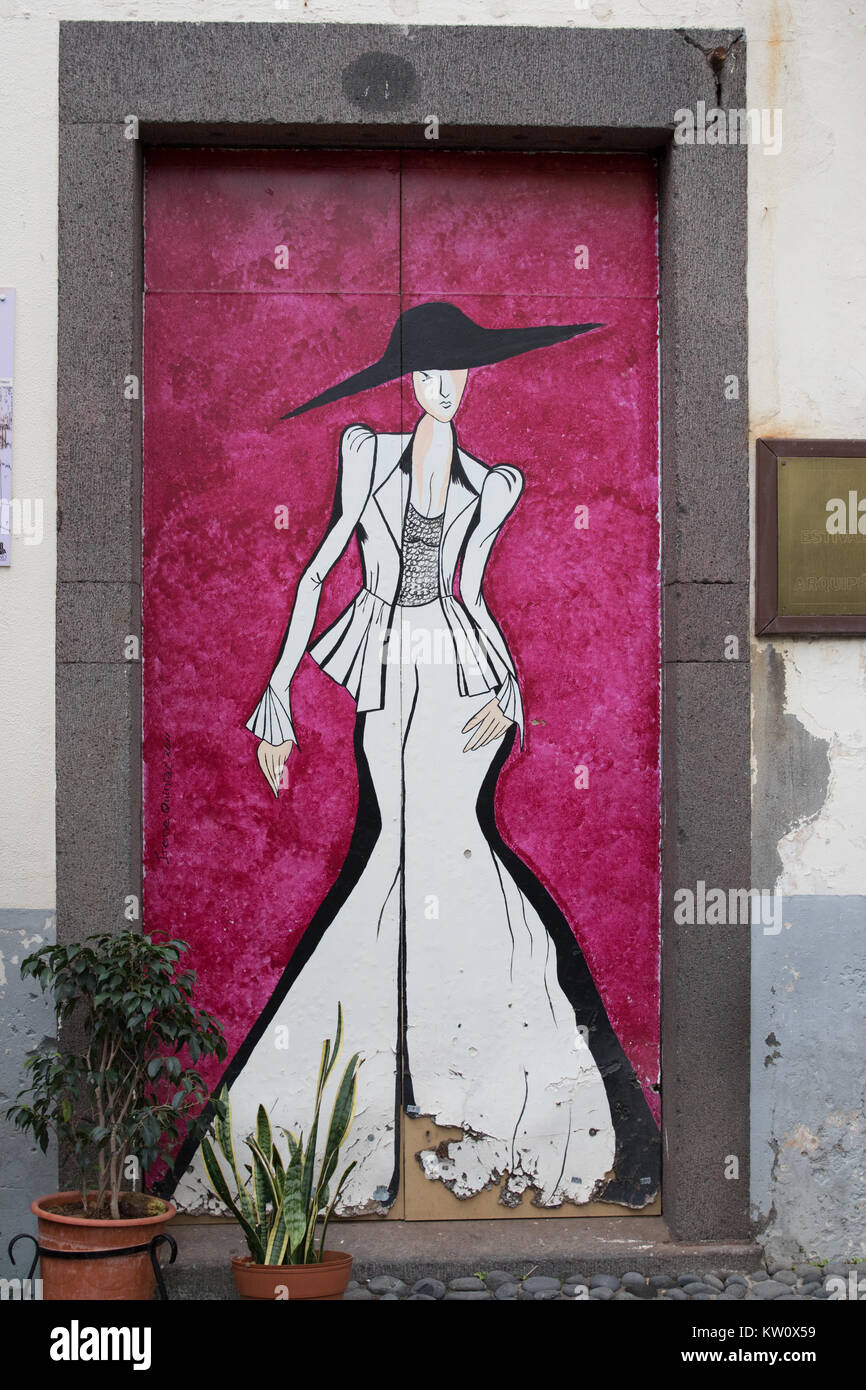 Fashionable woman in street art on Santa Maria Street in Old Town, Funchal, Madeira, Portugal Stock Photo