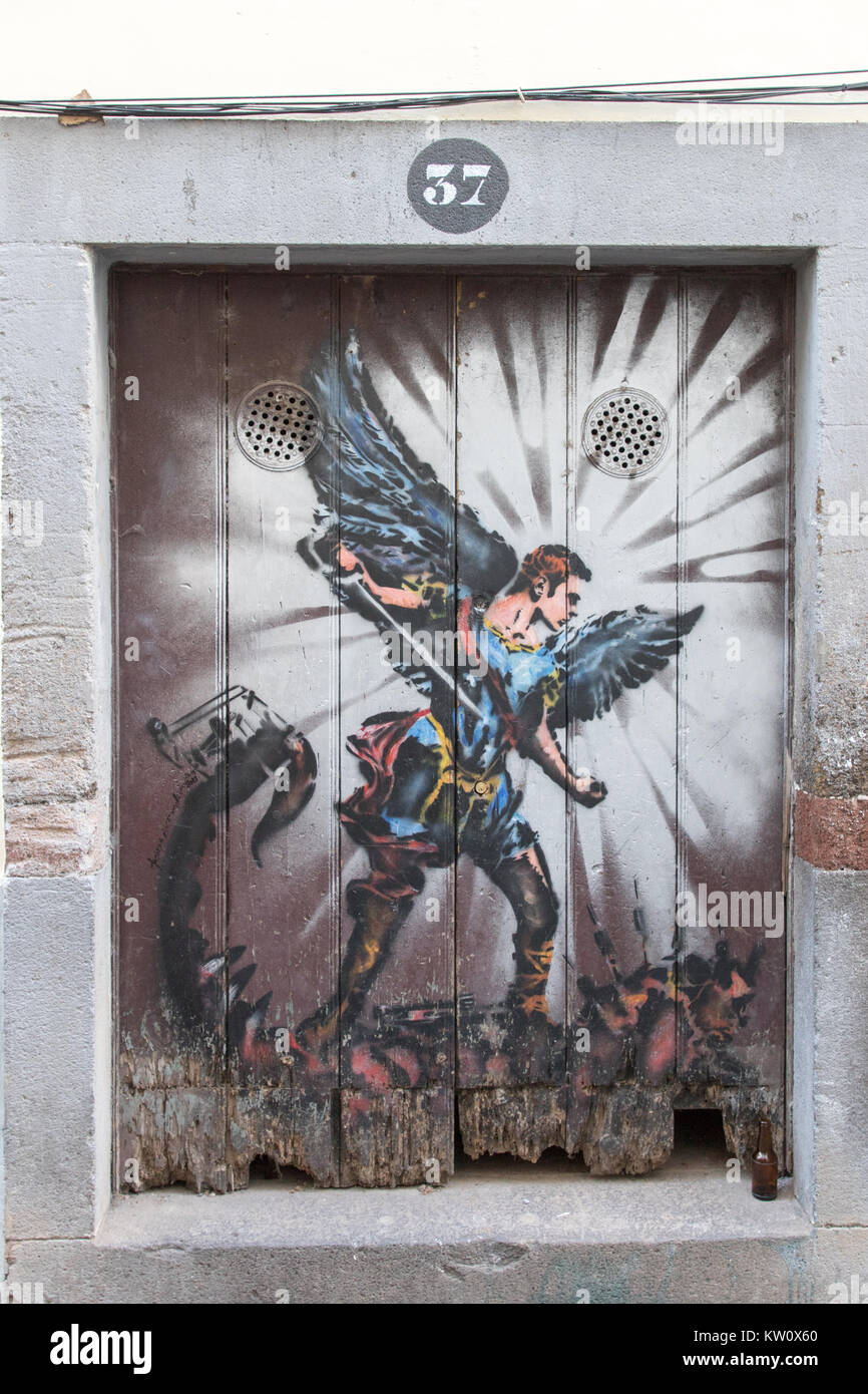 Avenging warrier hero street art on Santa Maria Street in Old Town, Funchal, Madeira, Portugal Stock Photo