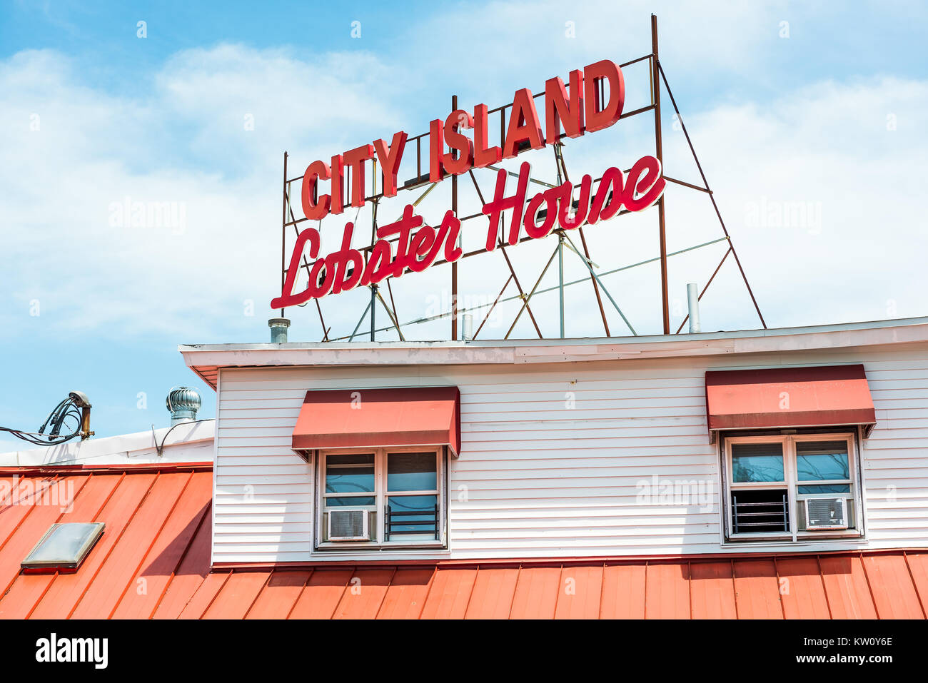 Bronx, USA - June 11, 2017: Restaurant sign in City Island called Lobster House on the water waterfront during day Stock Photo