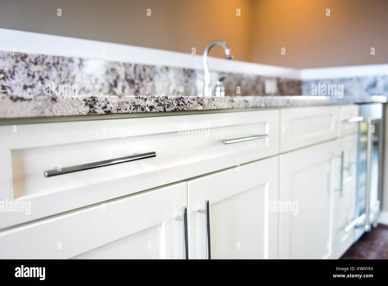 Modern Clean Wet Bar With Granite Countertop Cabinets Faucet In