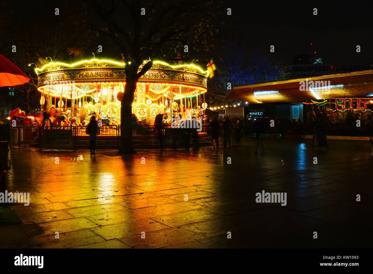 London carosel at Night in Southbank Stock Photo