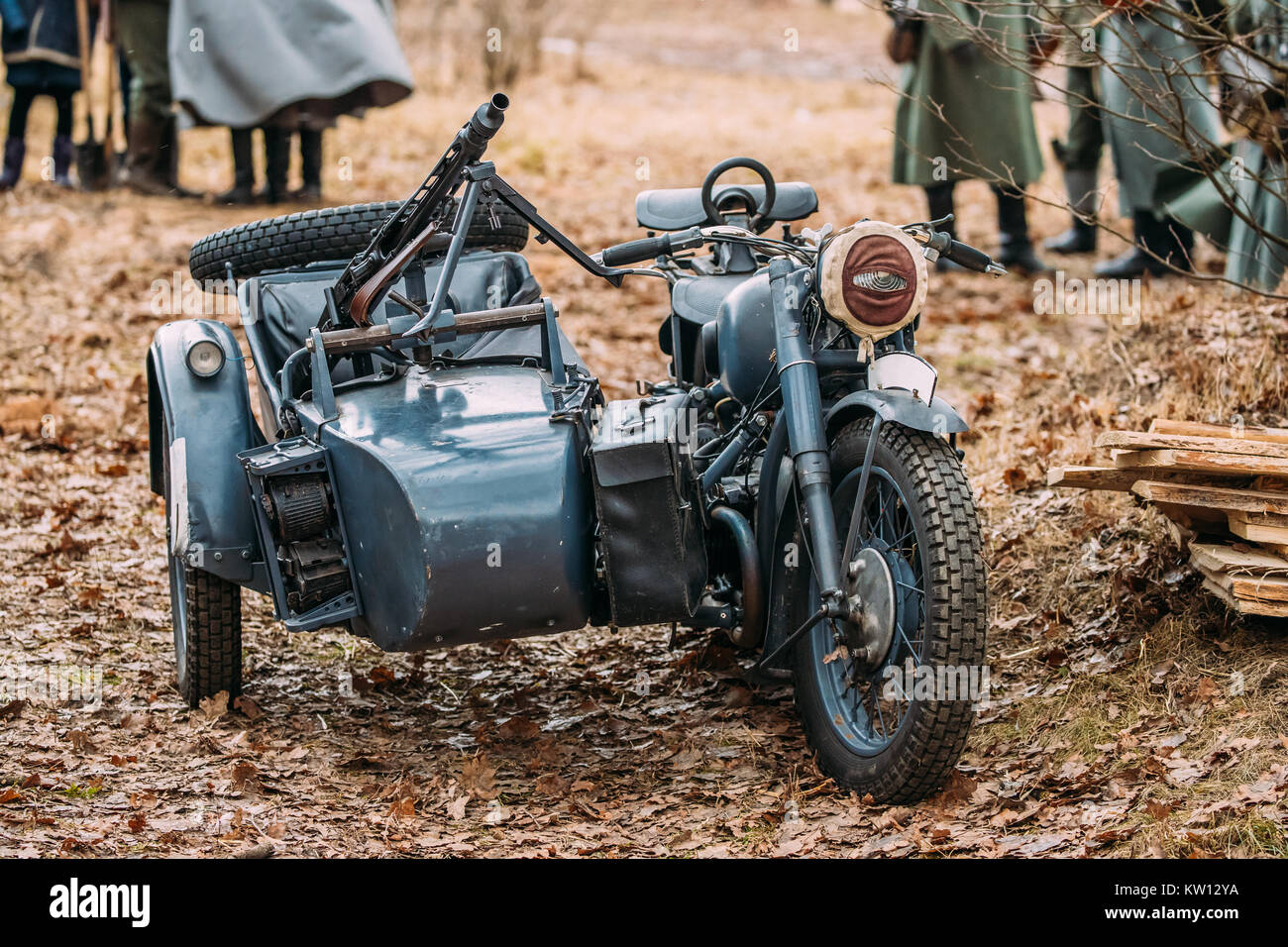 Old Tricar, Three-Wheeled Motorbike With Machine Gun On Sidecar Of Wehrmacht, Armed Forces Of Germany Of World War II Time In Autumn Forest. Stock Photo