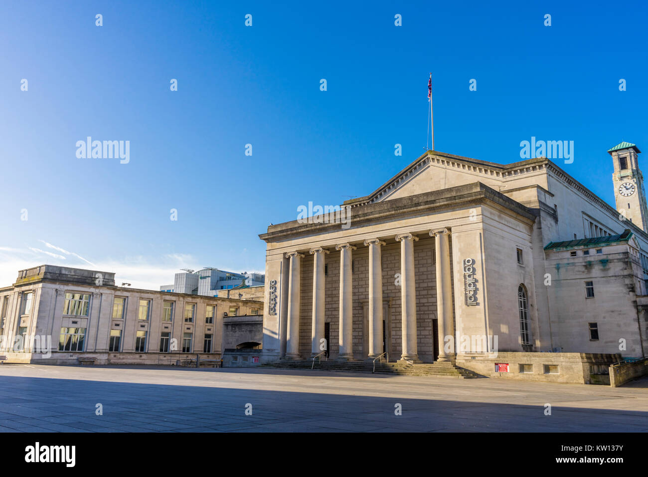 View over Guildhall Square, on a sunny day with blue sky, to the O2 Guildhall and The Civic Centre clock tower, Southampton City Centre, England, UK Stock Photo