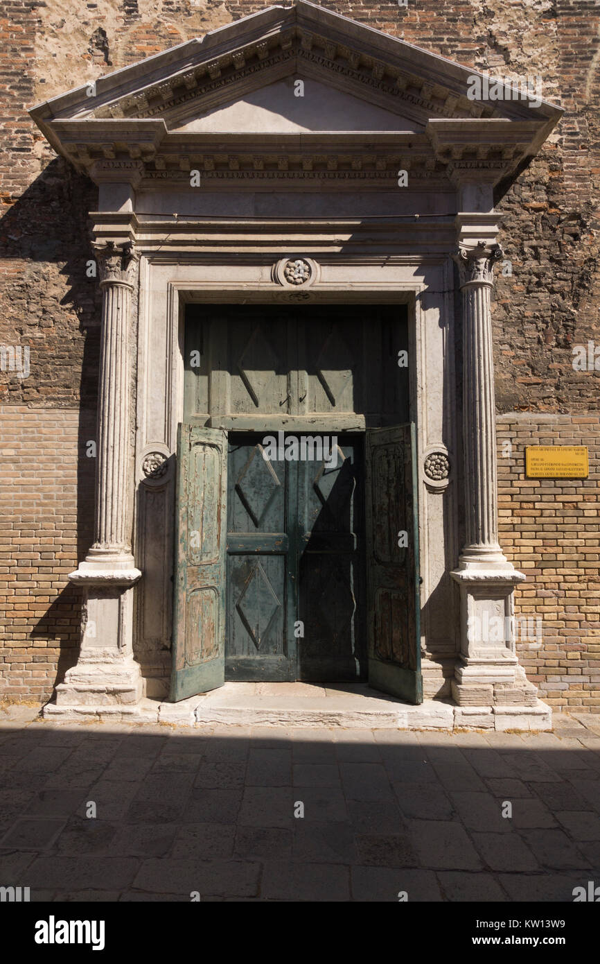 The entrance to San Pietro Martire (English: St. Peter Martyr), a Roman catholic parish church in Murano, Venice Stock Photo