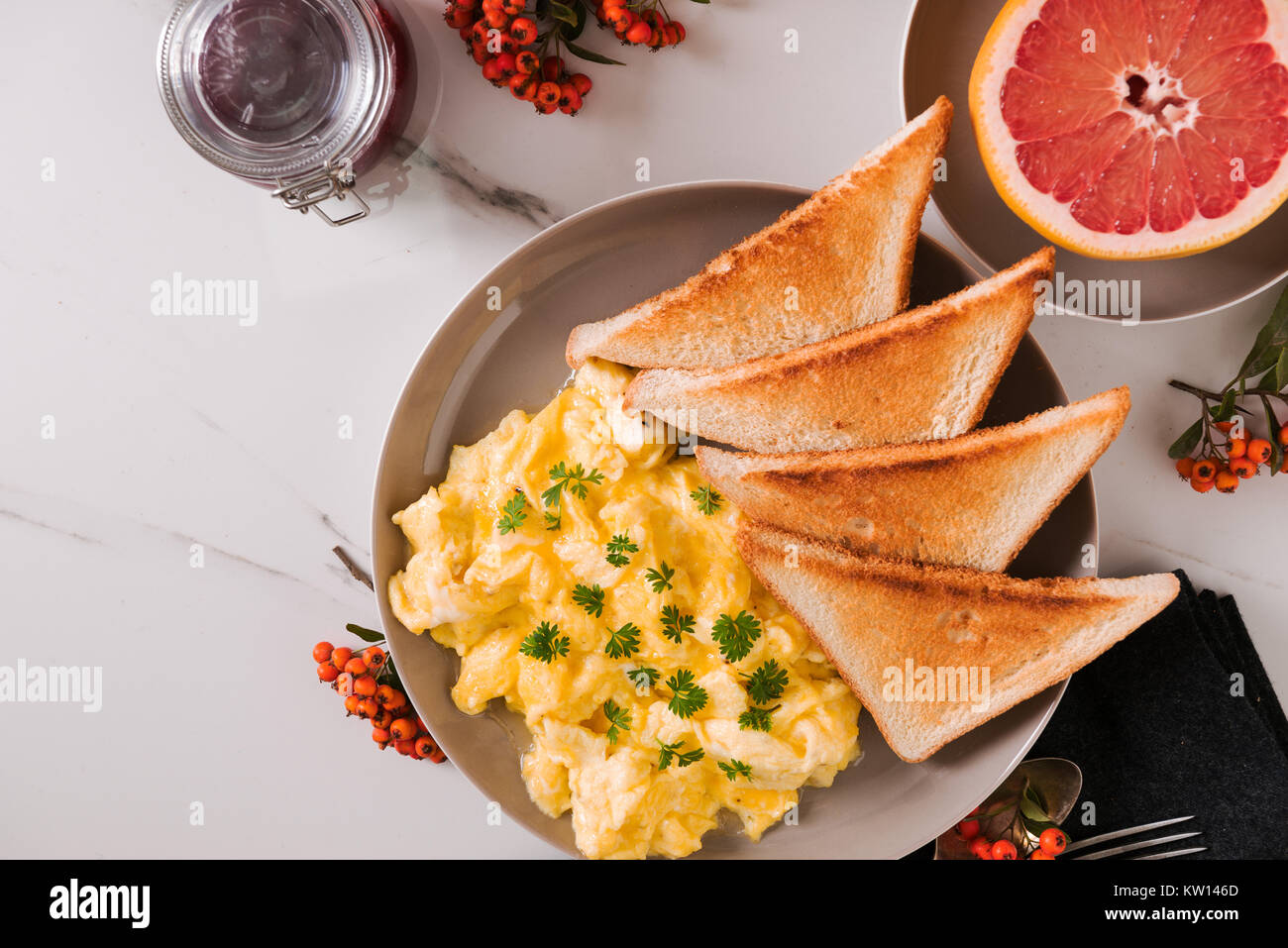 Scrambled Eggs With Toast Fruit Juice Jelly And Peanut Butter