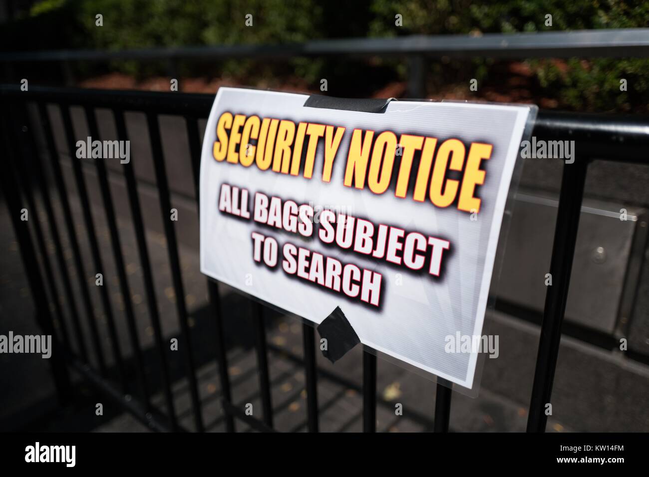 A security notice on a police barricade, indicating that 'All Bags Are Subject to Search', Manhattan, New York City, New York, July, 2016. Stock Photo