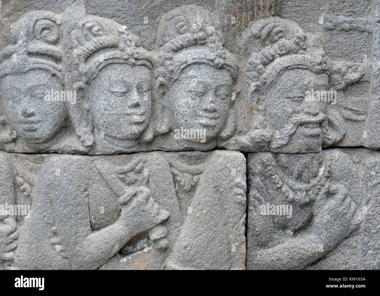 Detail of Buddhist carved relief in Borobudur temple in Yogyakarta, Java, Indonesia.. Stock Photo