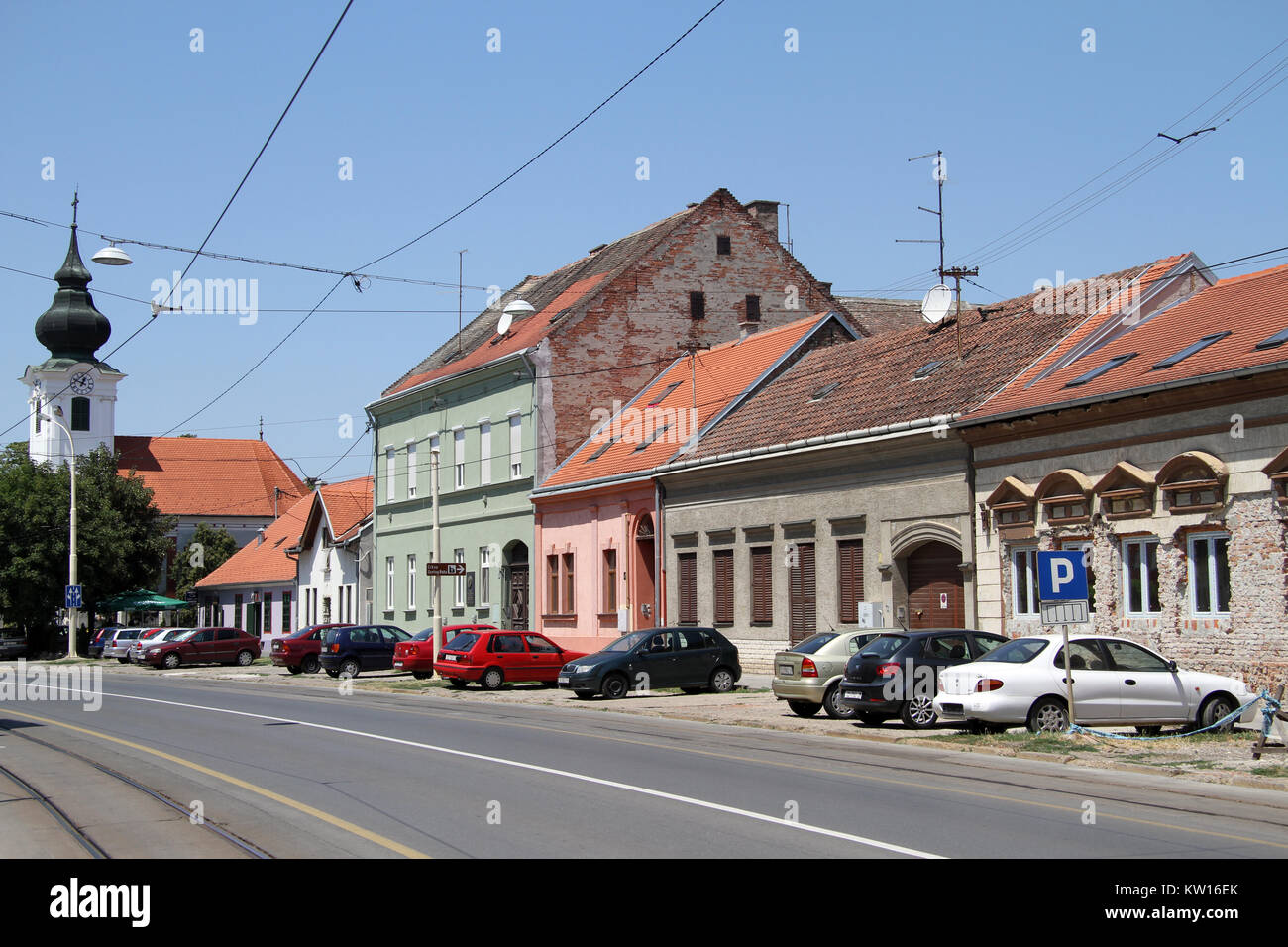 Church and houses on the street in Osijek, Croatia Stock Photo Alamy
