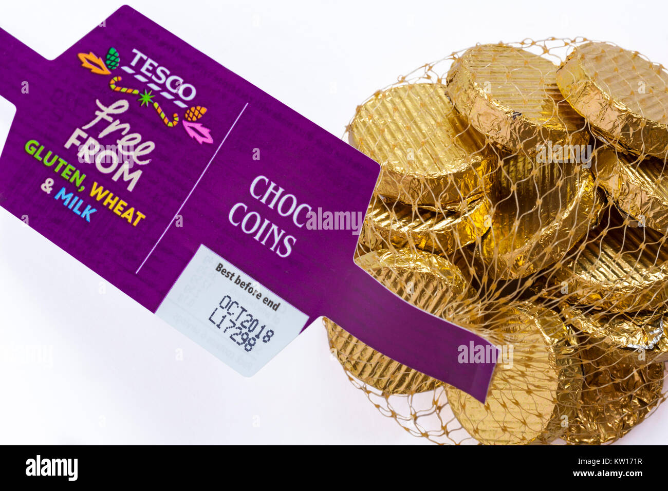 Net of Tesco choc coins free from gluten wheat & milk in netted bag set on white background Stock Photo