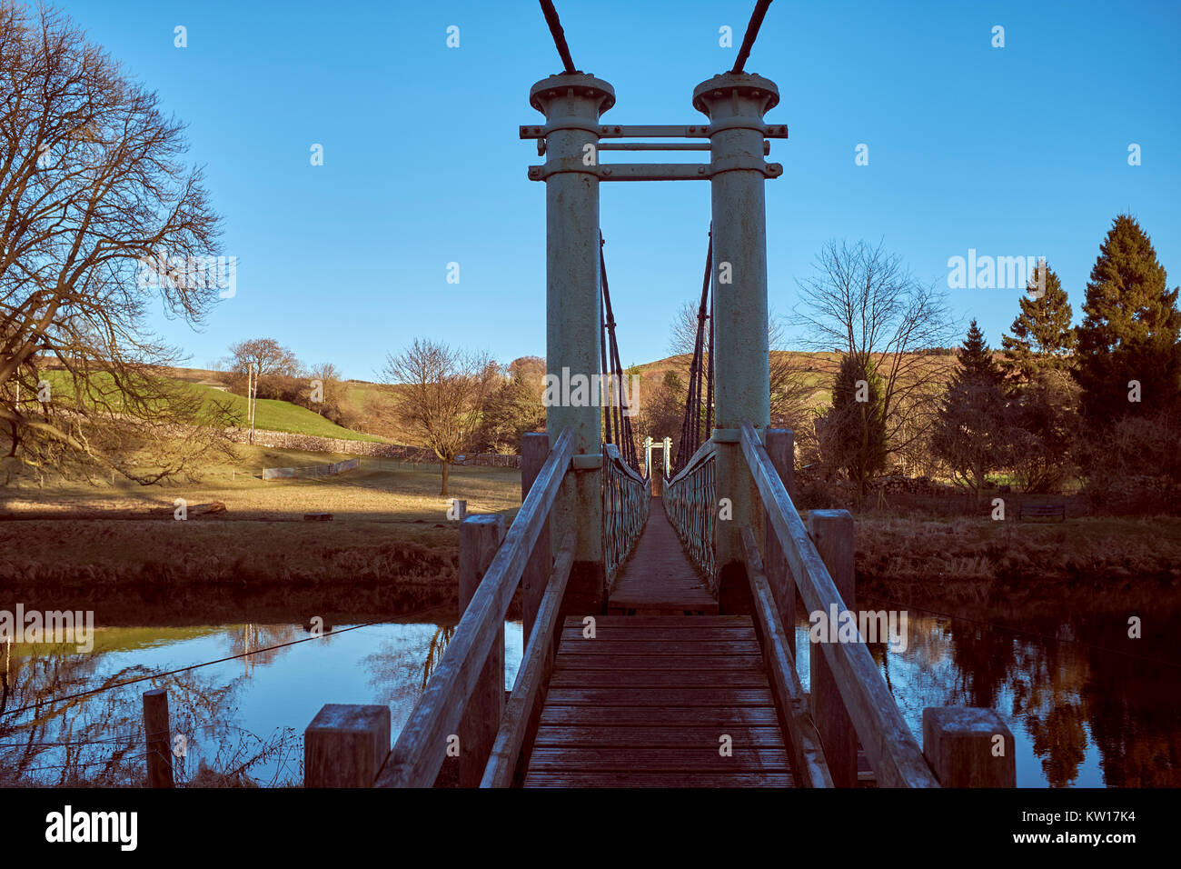 Renovated narrow footbridge over River Wharfe by Burnsall. Wharfedale, North Yorkshire. Donations Eileen King in memory of her partner Roy Docherty Stock Photo