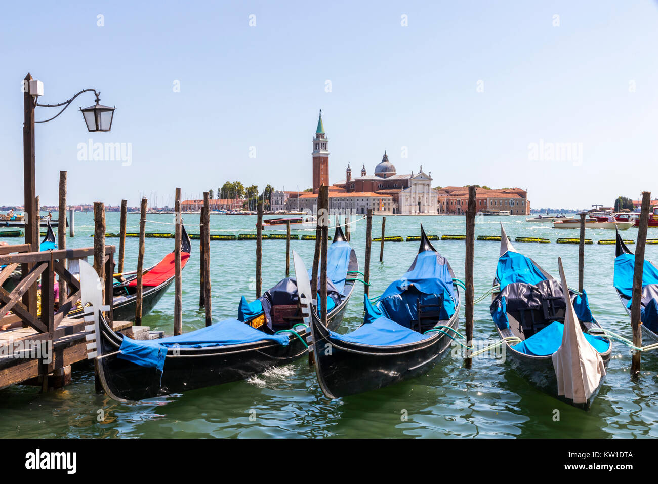 San Giorgio Maggiore, a 16th-century Benedictine church in Venice, northern Italy, designed by Andrea Palladio, with traditional gondolas in the foreg Stock Photo