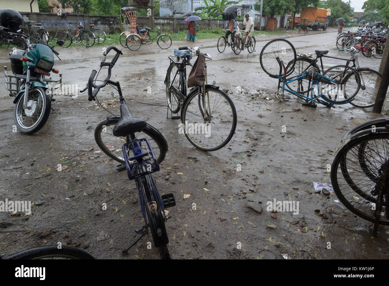 Rupandehi District, Nepal. Bikes waiting in the rain Stock Photo
