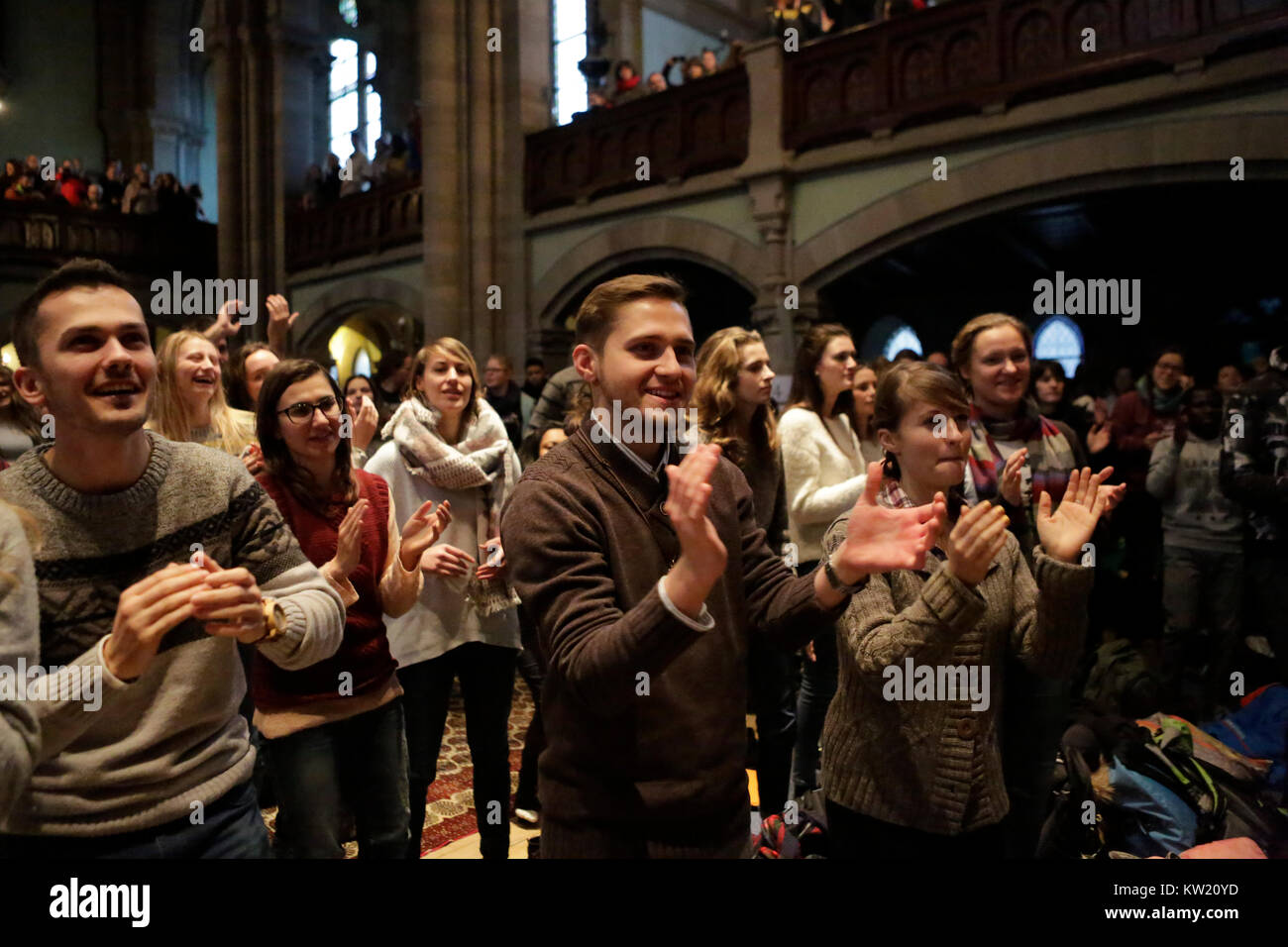 Basel, Switzerland. 29th December 2017. Young pilgrims sing and dance in the Matthäuskirche to music performed by African Christians. unity also held a press conference with some informations about the meeting. Credit: Michael Debets/Alamy Live News Stock Photo