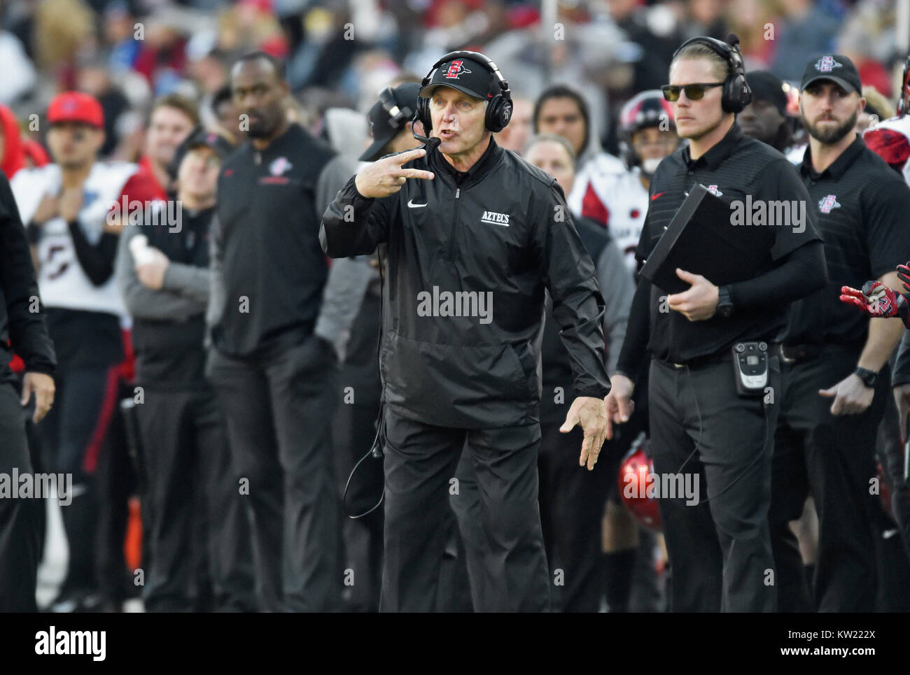 December 23, 2017 - San Diego State coach Rocky Long makes a call to his players during the second quarter of a NCAA college football game against Army in the Lockheed Martin Armed Forces Bowl at Amon G. Carter Stadium in Fort Worth, Texas. Army won 42-35. Austin McAfee/CSM Stock Photo