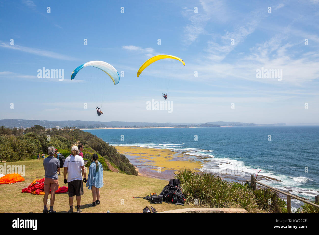 Paragliders enjoying the thermal currents at Long Reef Point on Sydney northern beaches,New South Wales,Australia Stock Photo