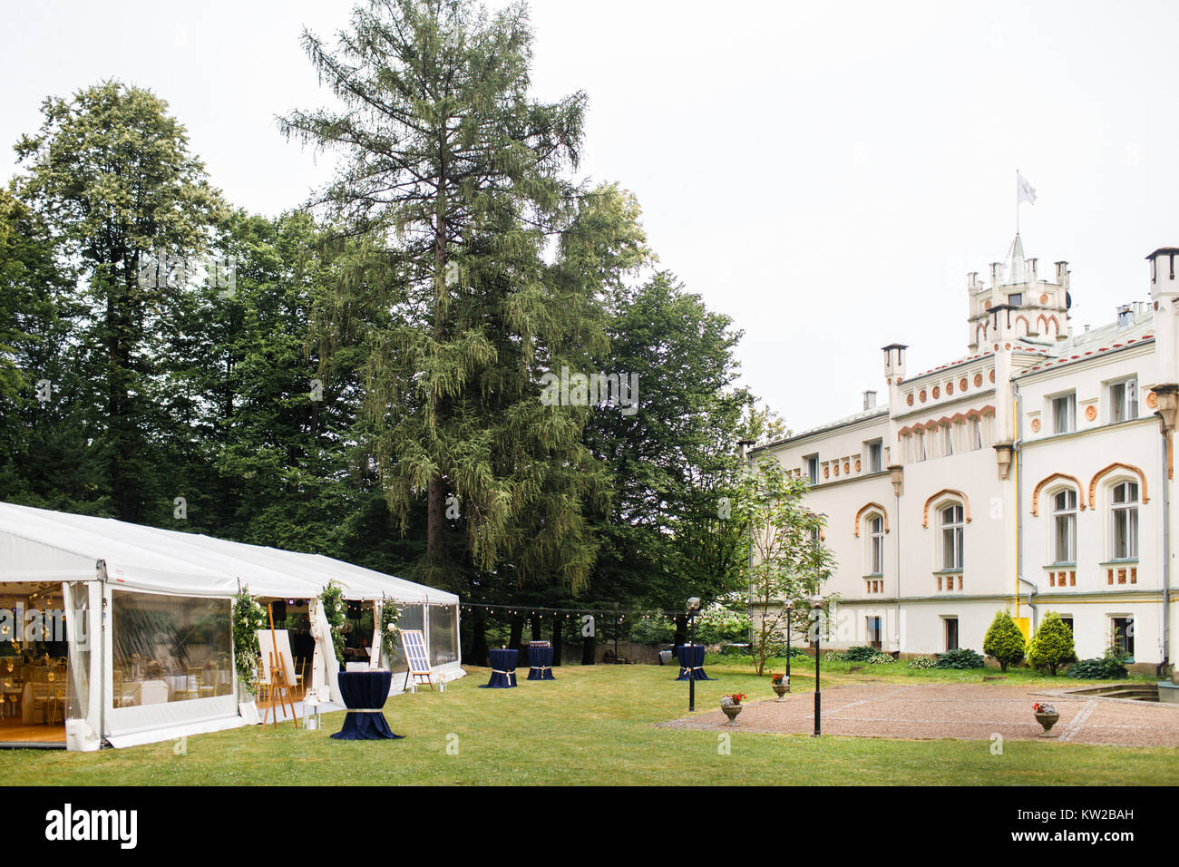 Long White Tent For Wedding Party In The Woods Stock Photo