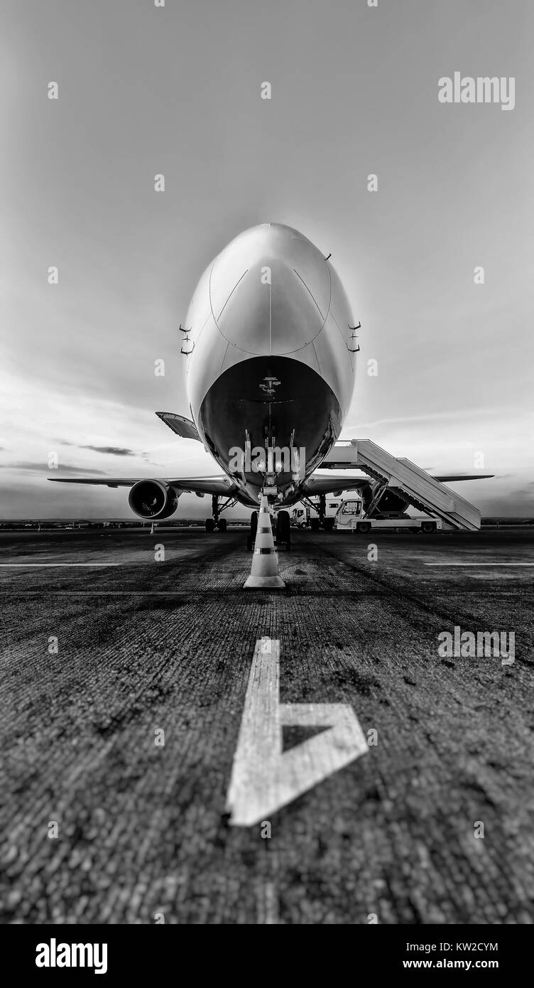 Passenger plane in the parking lot, aiport parking, Passenger plane in the airport. Aircraft maintenance Stock Photo