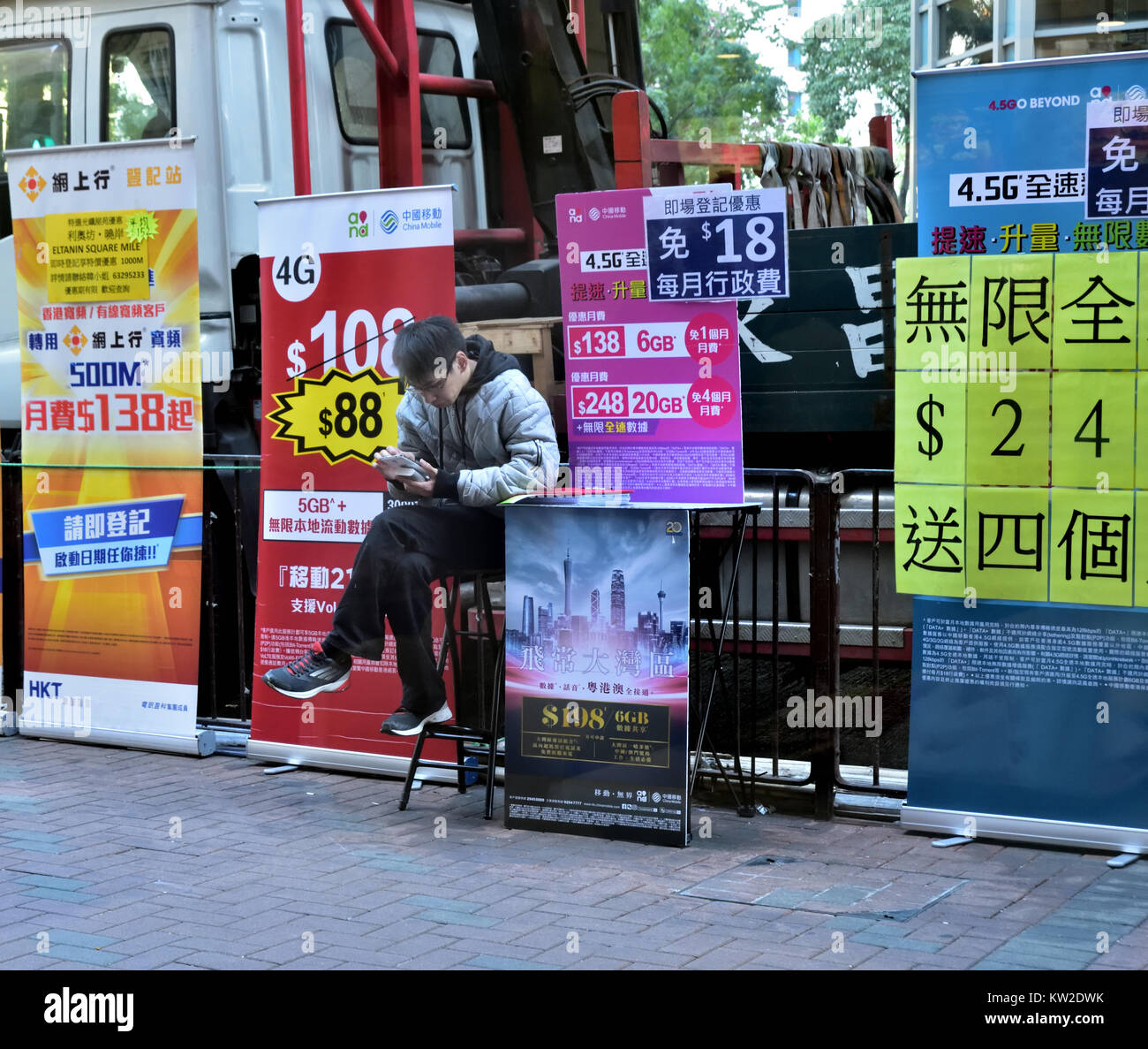 Street booth for promotion of broadband services plans, Kowloon, Hong