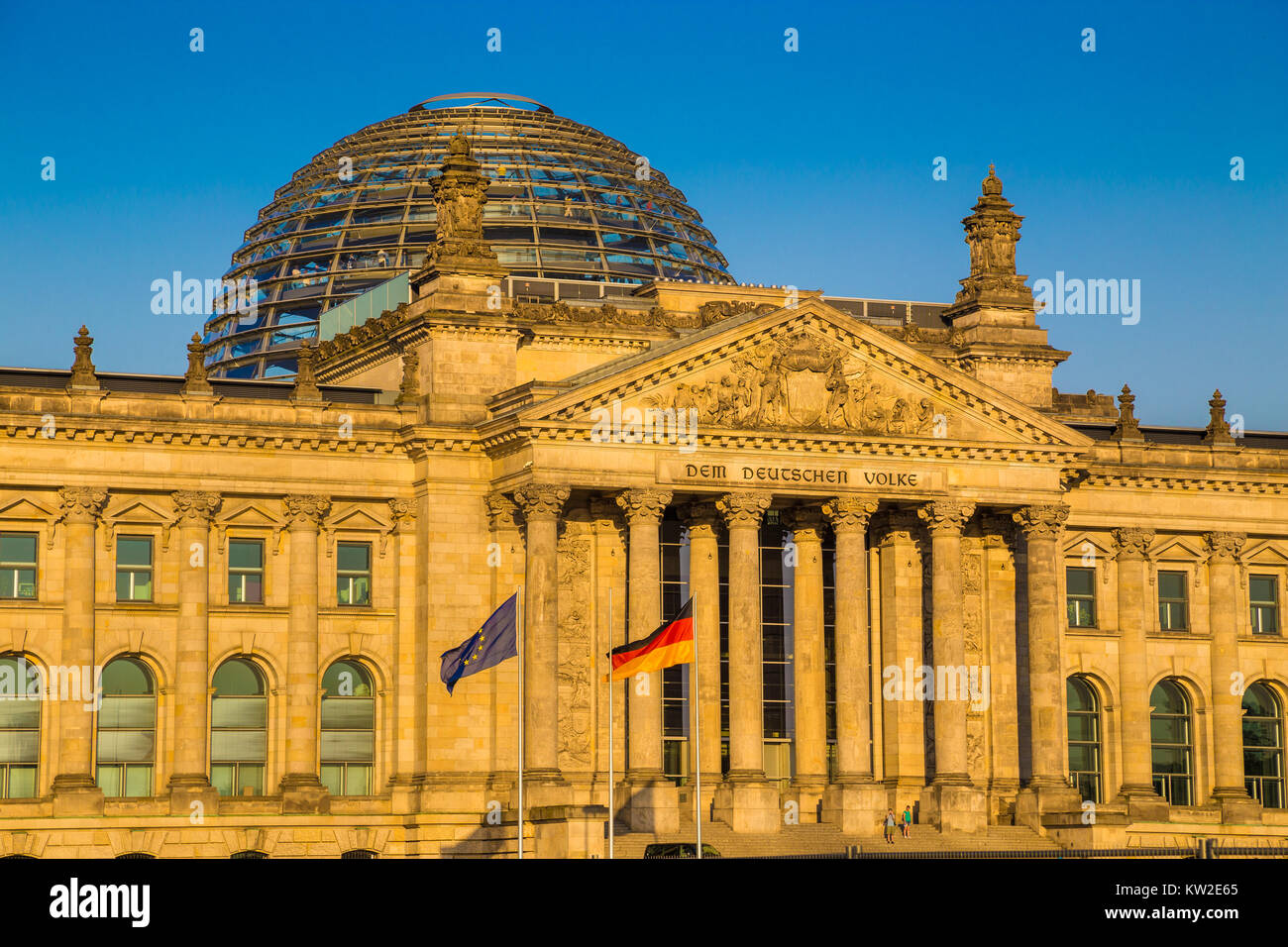 Close-up view of famous Reichstag building, seat of the German Parliament (Deutscher Bundestag), in beautiful golden evening light at sunset, Berlin Stock Photo