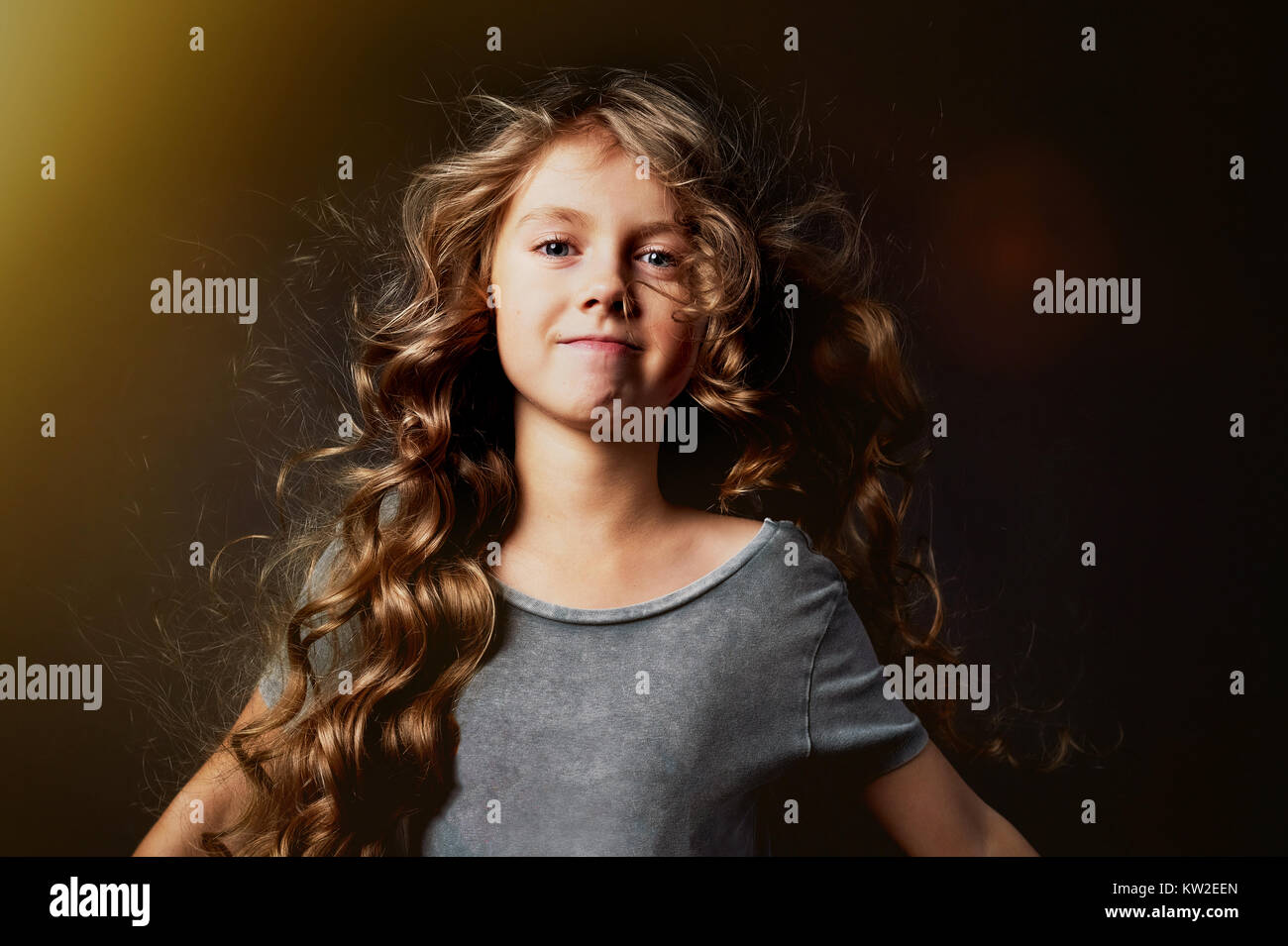 Kinky Girl With Long Hair In The Light Of The Flare And Enjoying