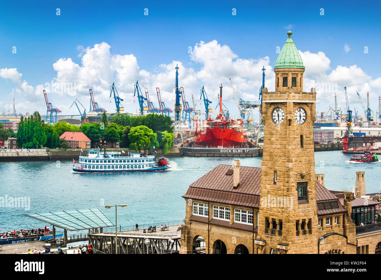 Famous Hamburger Landungsbruecken with harbor and traditional paddle steamer on Elbe river, St. Pauli district, Hamburg, Germany Stock Photo