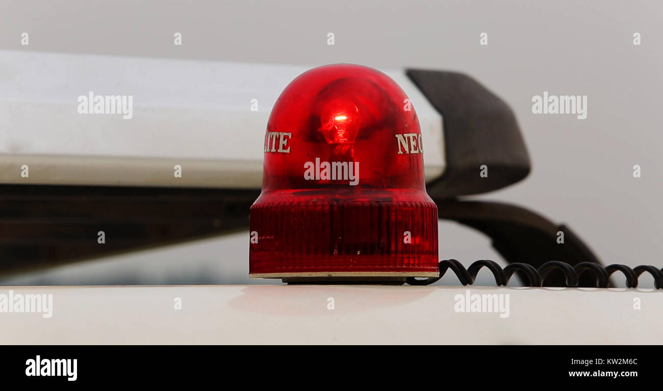 flashing red emergency light that is isolated on white Stock Photo Alamy