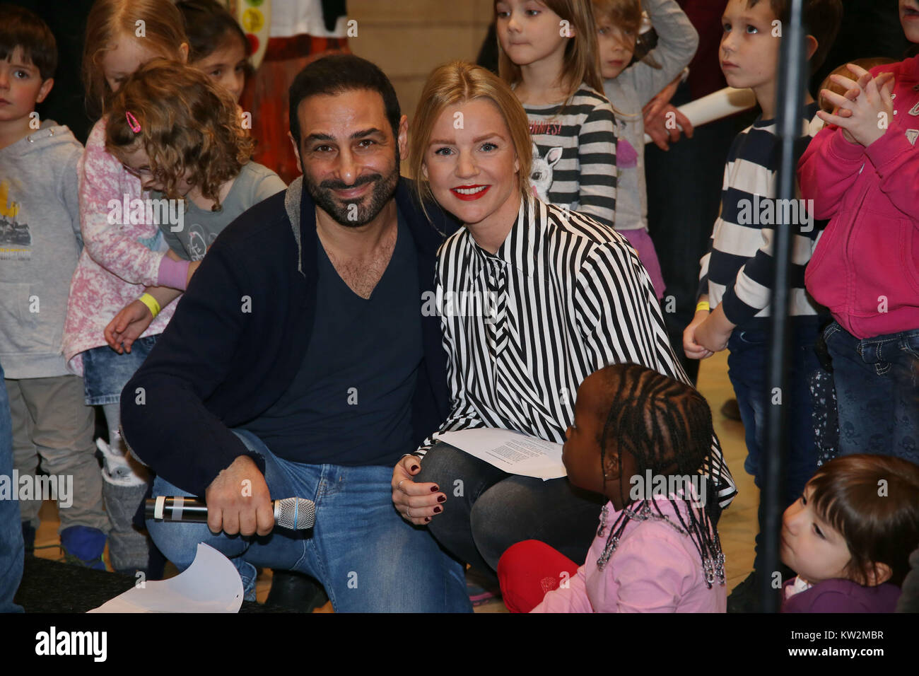 Charity gift wrapping with stars for 'Ein Herz fuer Kinder' at the shopping mall Europa Passage in Hamburg  Featuring: Kim Sarah Brandts, Volkan Baydar Where: Hamburg, Germany When: 27 Nov 2017 Credit: Becher/WENN.com Stock Photo