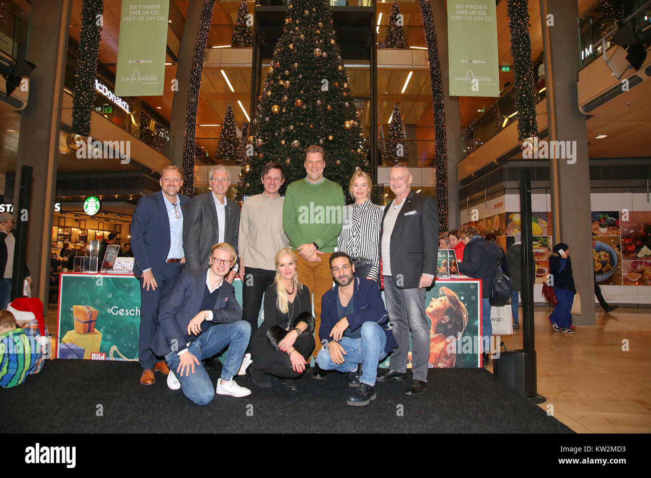 Charity gift wrapping with stars for 'Ein Herz fuer Kinder' at the shopping mall Europa Passage in Hamburg  Featuring: Kim Sarah Brandts, Anna Heesch, Tim Koller, Harry Schulz, Volkan Baydar, Tetje Mierendorf und Gerhard Loewe (Manager) Where: Hamburg, Germany When: 27 Nov 2017 Credit: Becher/WENN.com Stock Photo