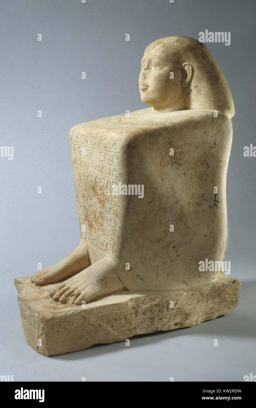 The Block Statue of Ankhwennefer, from ancient Egypt, represents a seated figure from the 25th Dynasty. Known for its detailed carving, the statue depicts the high-ranking official Ankhwennefer in a traditional Egyptian pose, serving as both an artistic and religious artifact. Stock Photo