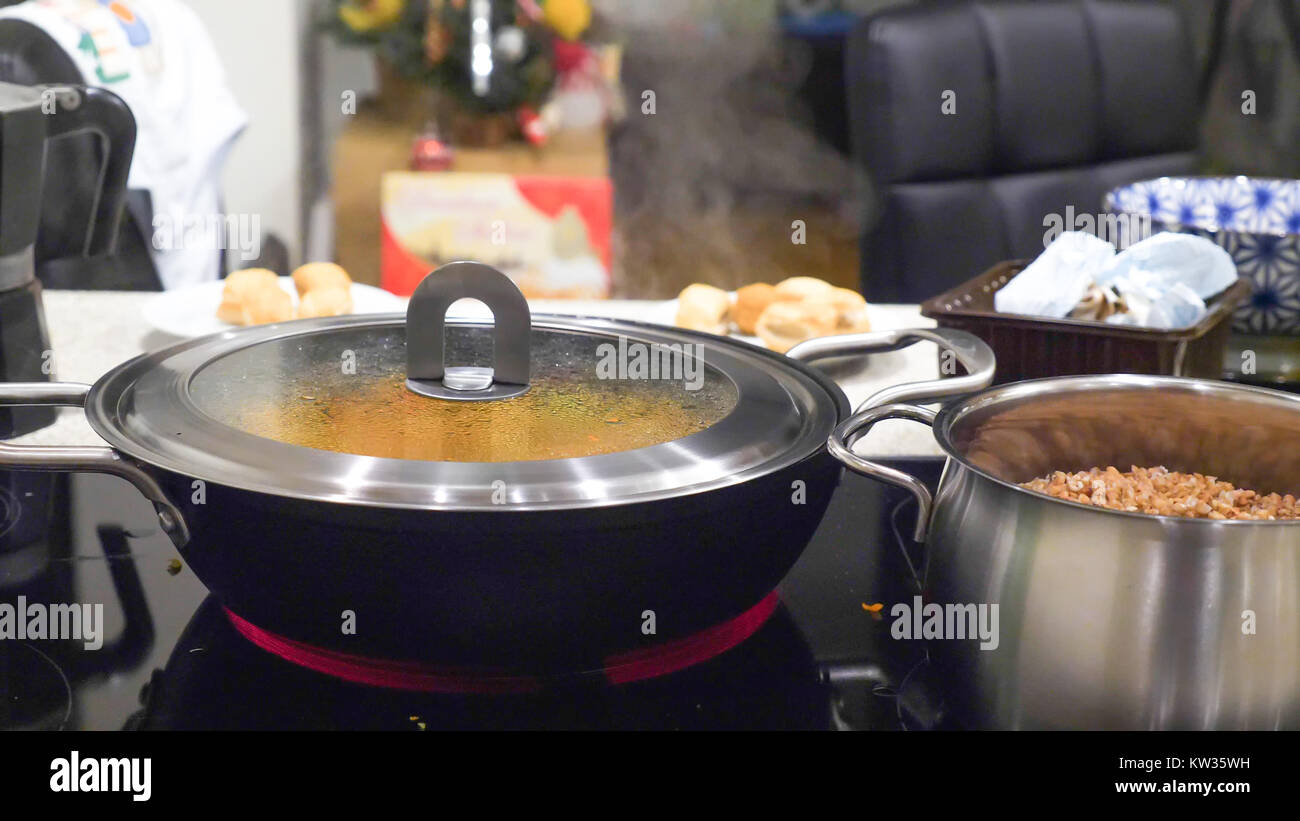 Fresh vegetable stew frying in pan casserole on modern electric cooker Stock Photo Alamy
