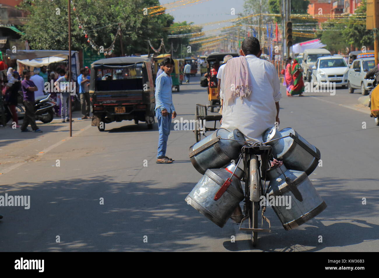 People commute in downtown Jaipur India. Stock Photo
