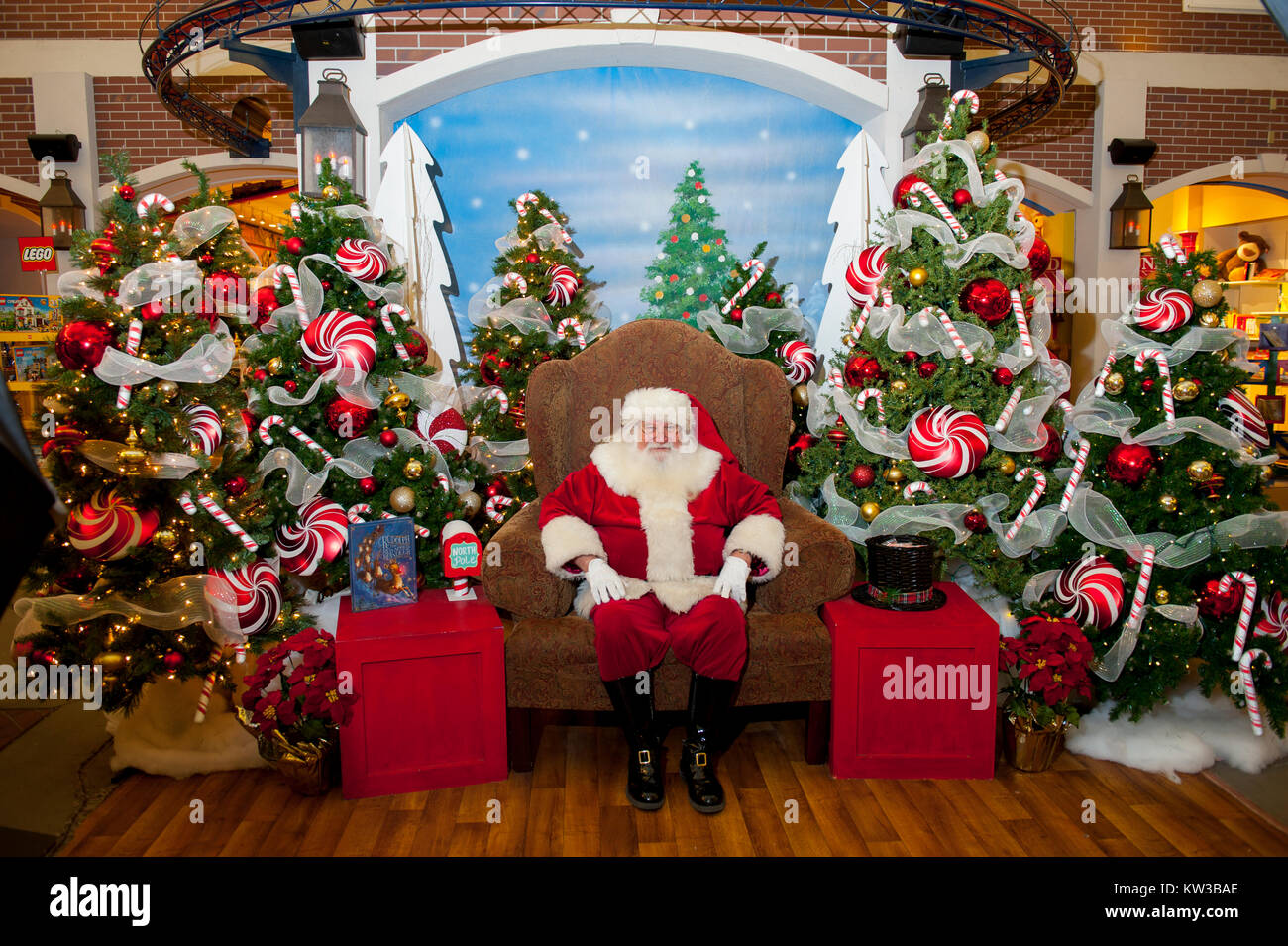 USA Virginia VA Williamsburg Santa Claus Father Christmas Saint Nicolas sitting in his chair Stock Photo