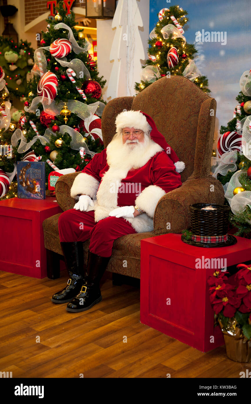 USA Virginia VA Williamsburg Santa Claus Father Christmas Saint Nicolas sitting in his chair Stock Photo