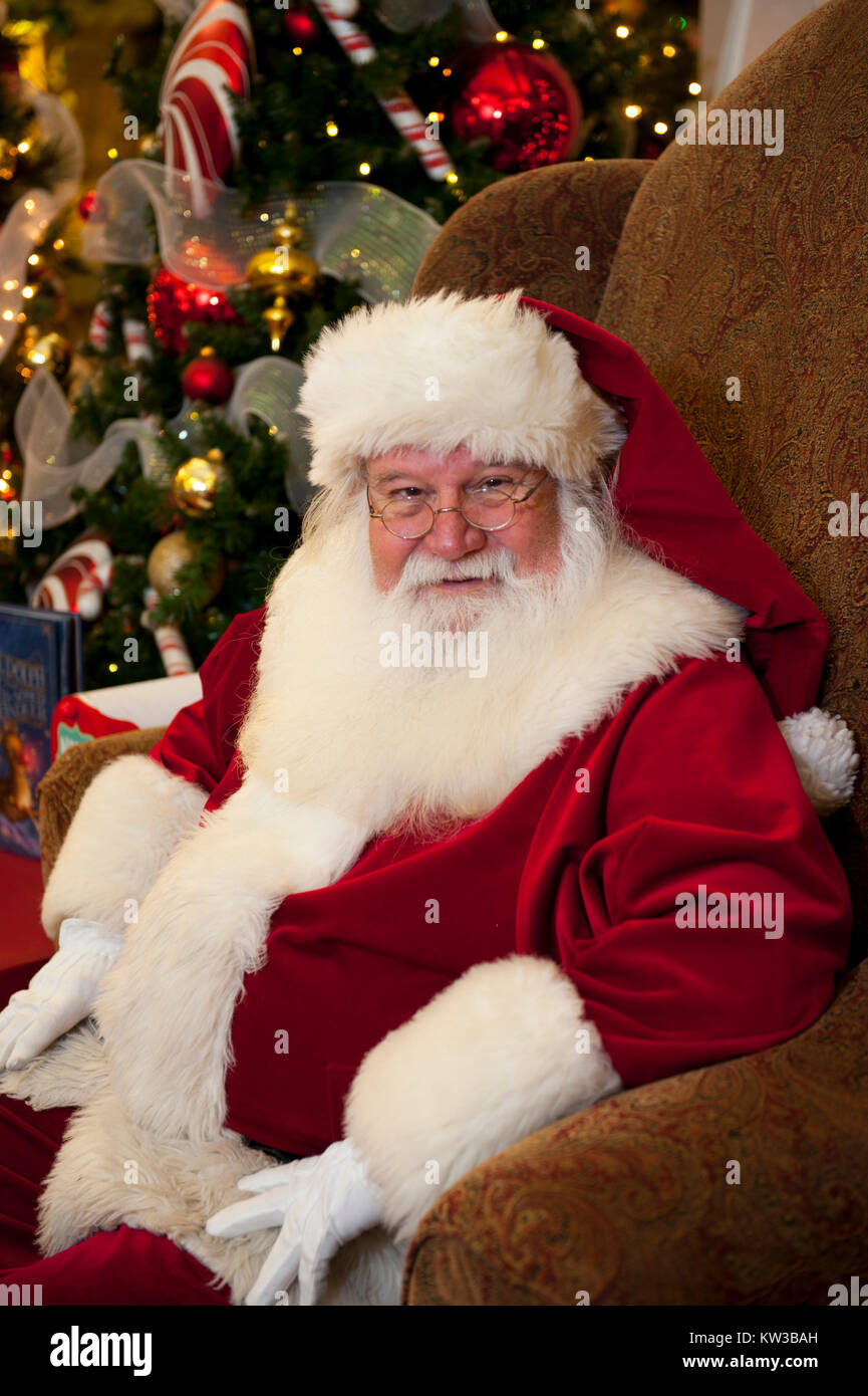 USA Virginia VA Williamsburg Santa Claus Father Christmas Saint Nicolas sitting in his chair Stock Photo