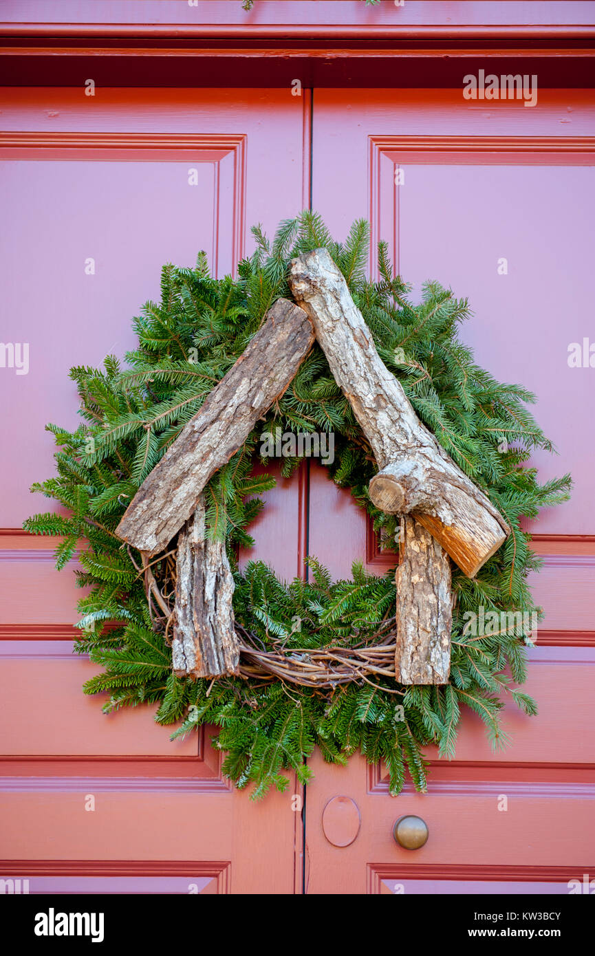 USA Virginia VA Colonial Williamsburg Christmas Holiday wreaths hanging on doors and windows on the Duke of Gloucester Street Stock Photo