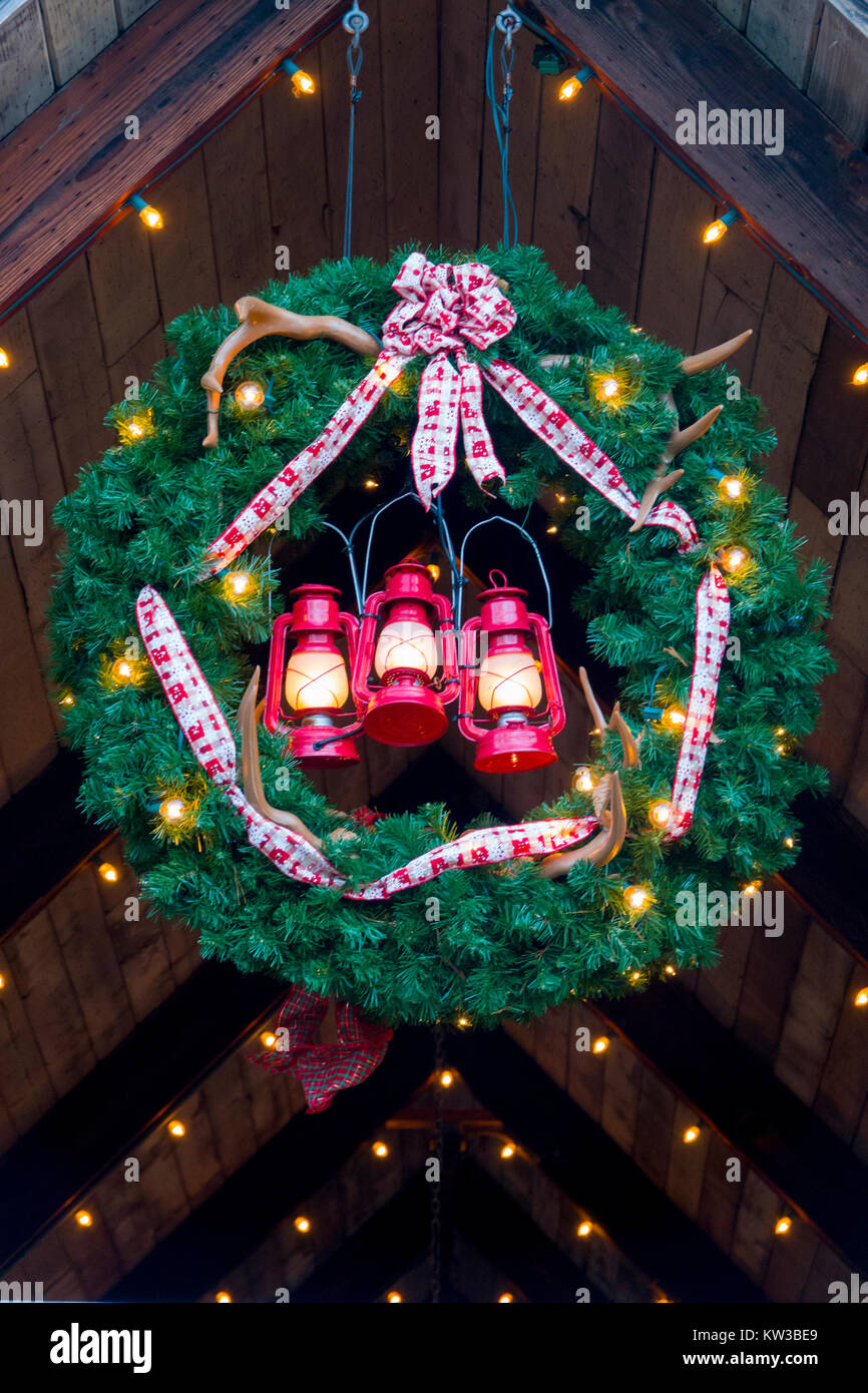 USA Virginia VA Williamsburg Christmas holiday at Busch Gardens theme park lanterns on a wreath Stock Photo
