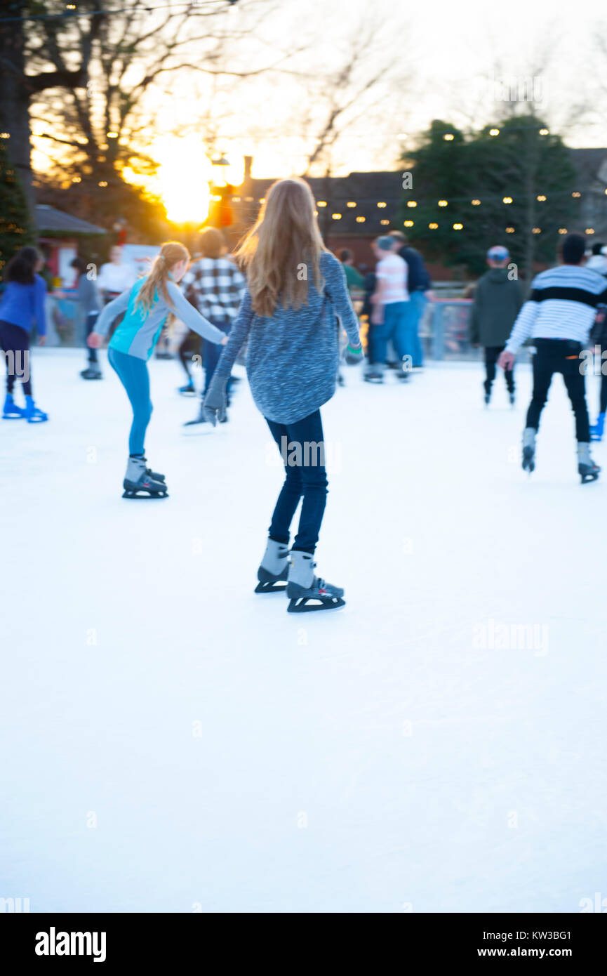 USA Virginia VA Colonial Williamsburg Christmas Winter Holidays Ice Skating on the Duke of Gloucester Street on a temporary rink Stock Photo