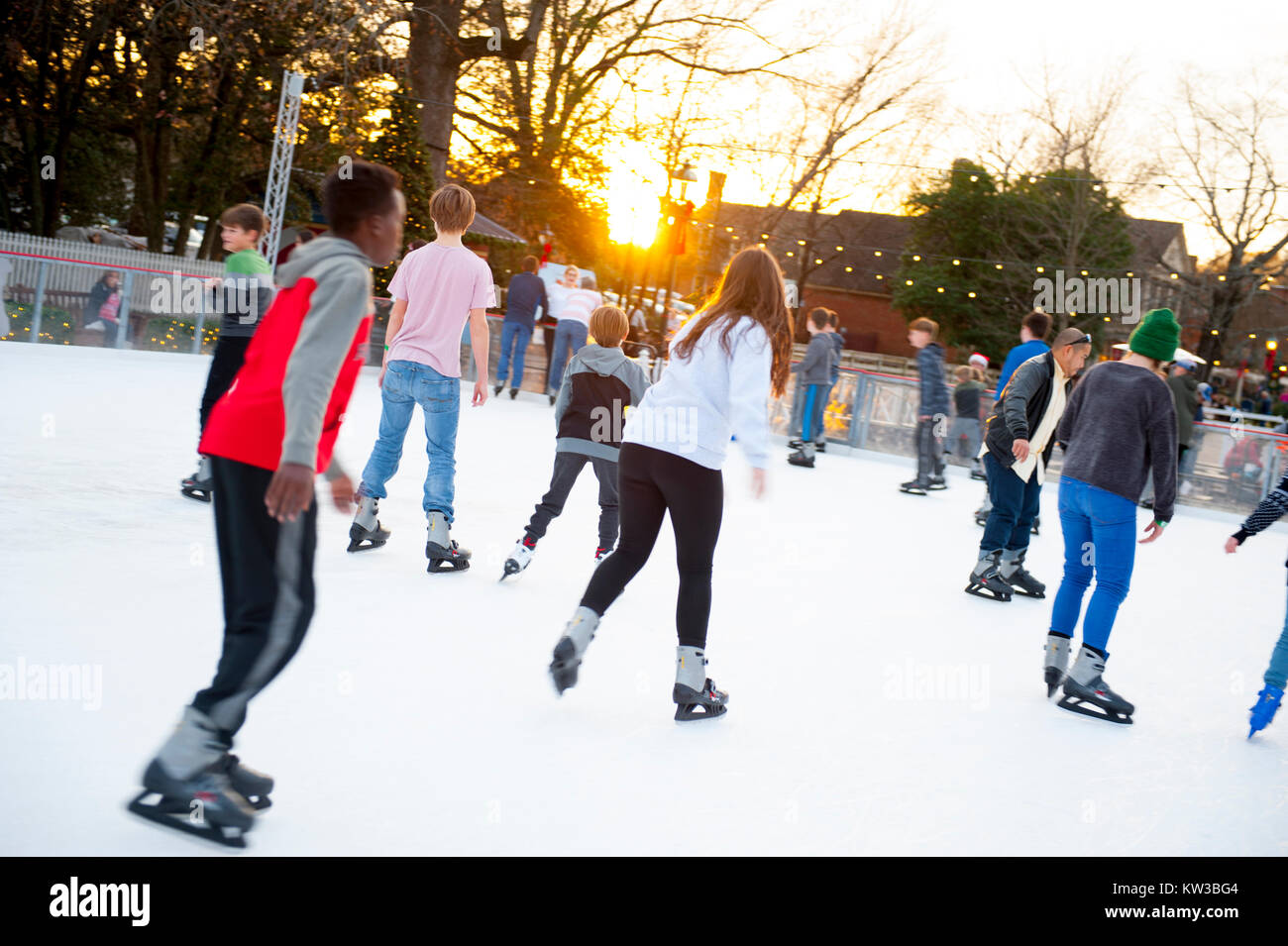 USA Virginia VA Colonial Williamsburg Christmas Winter Holidays Ice Skating on the Duke of Gloucester Street on a temporary rink Stock Photo