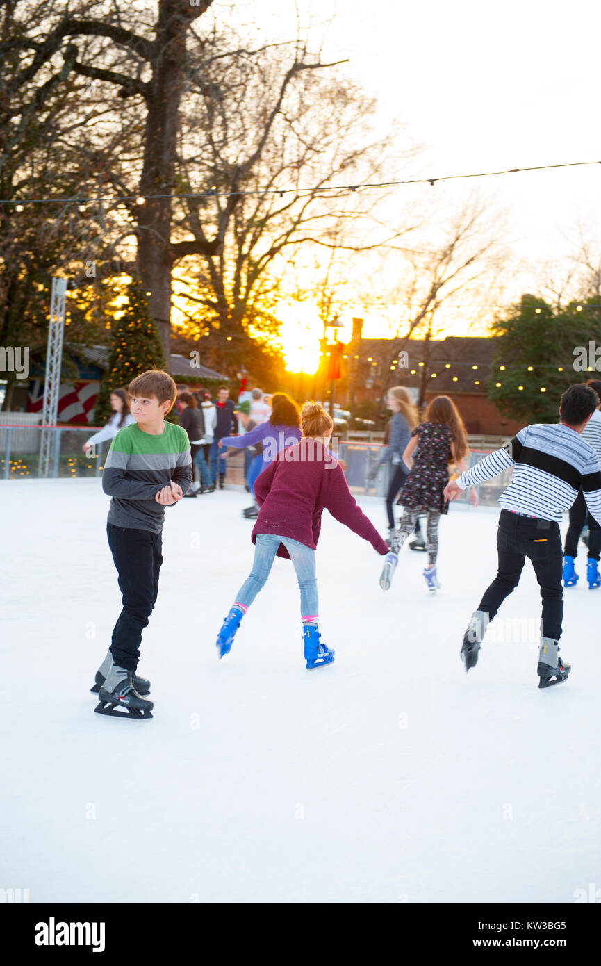 USA Virginia VA Colonial Williamsburg Christmas Winter Holidays Ice Skating on the Duke of Gloucester Street on a temporary rink Stock Photo