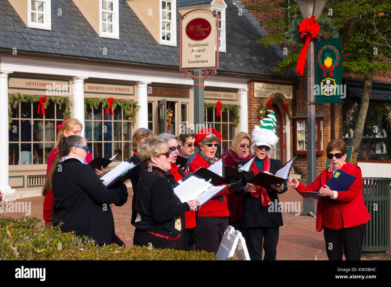 USA Virginia VA Colonial Williamsburg Christmas caroling on Duke of Gloucester Street at Merchants Square Stock Photo