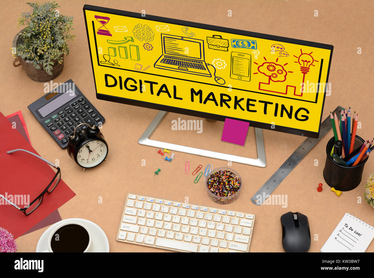 Digital Marketing Drawing Icons on Office Table Computer Stock Photo